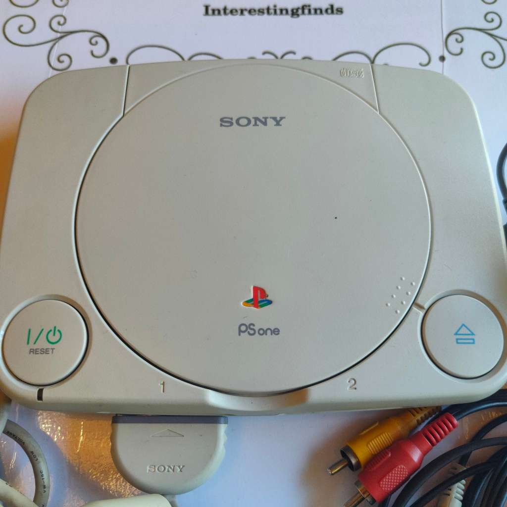 Original Sony Playstation one (PS one) with original controller and cables