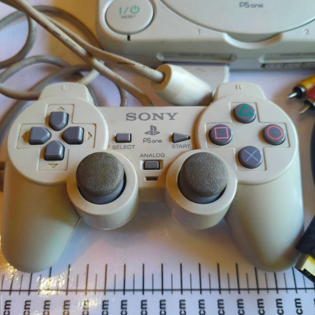 Original Sony Playstation one (PS one) with original controller and cables