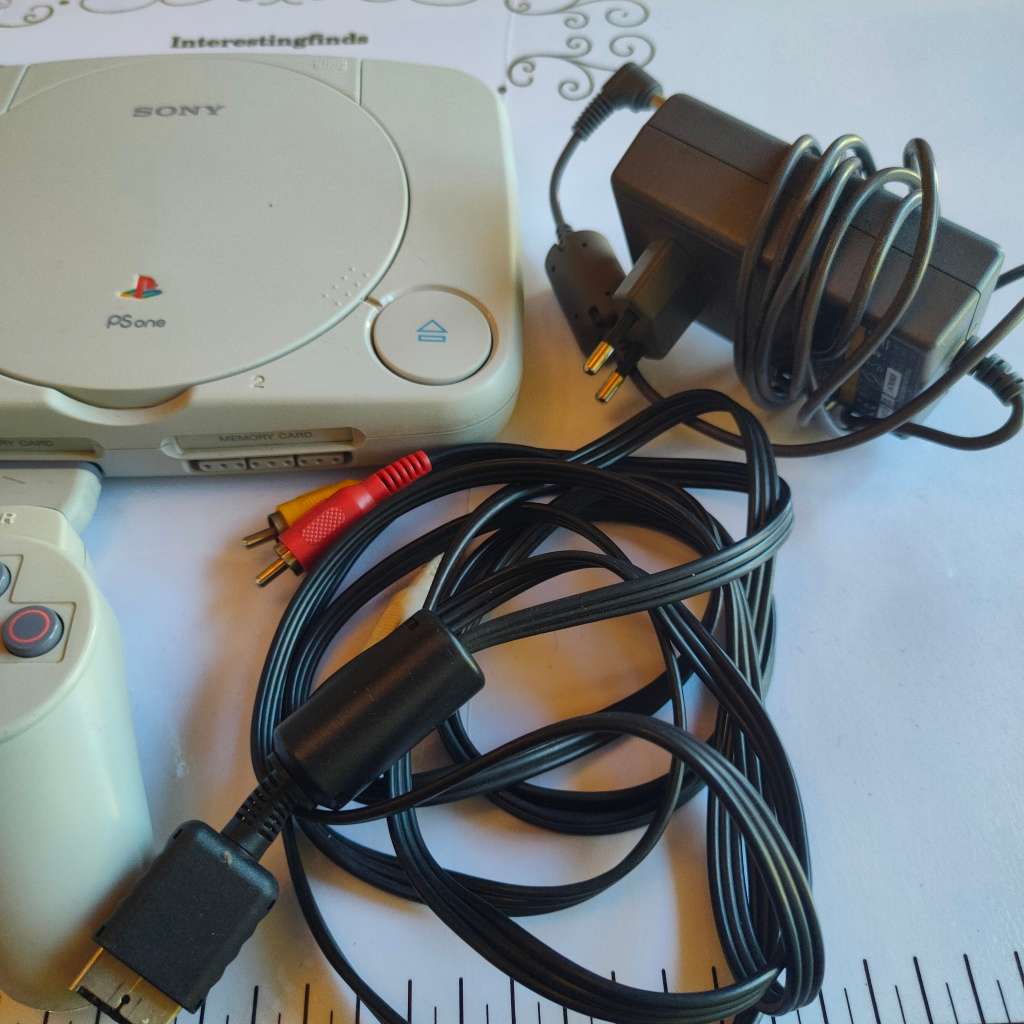 Original Sony Playstation one (PS one) with original controller and cables
