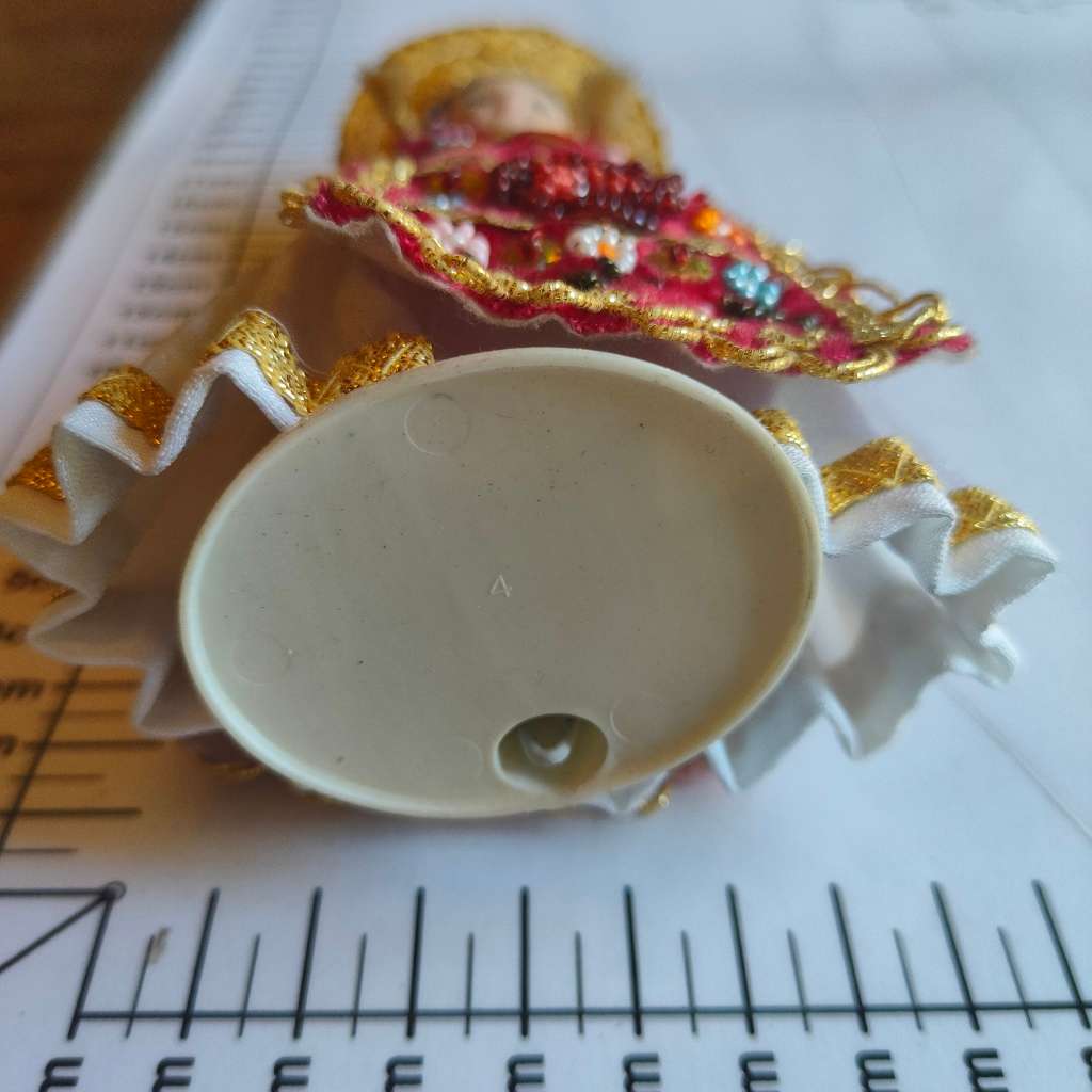 Adorable souvenir doll