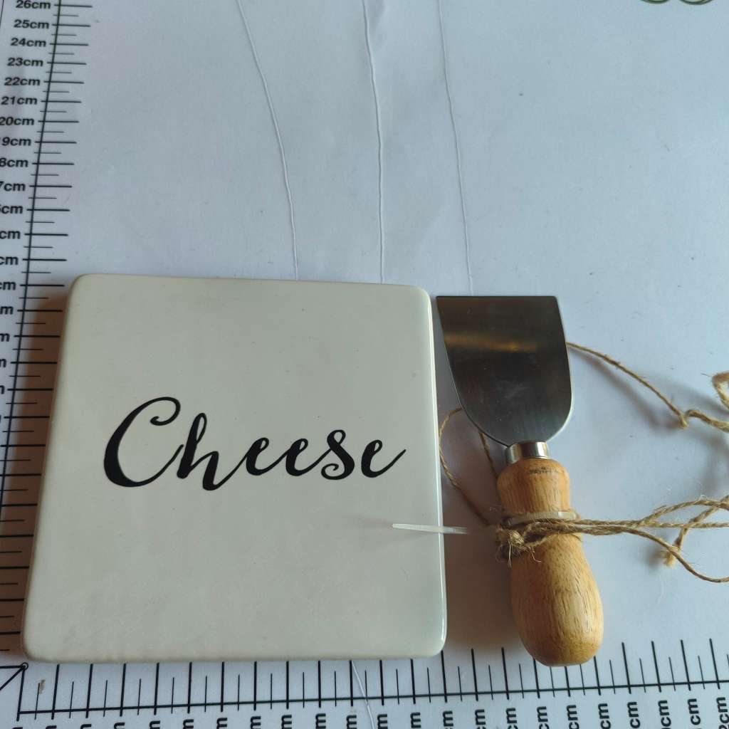 Ceramic cheese board with knife