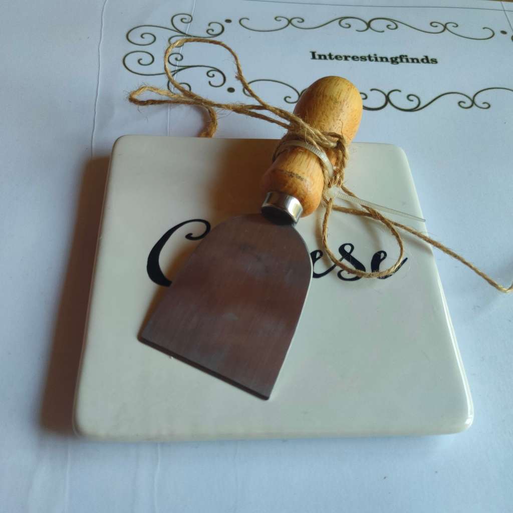 Ceramic cheese board with knife