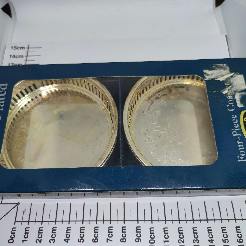 Vintage Elweco four-piece coaster set - silverplated