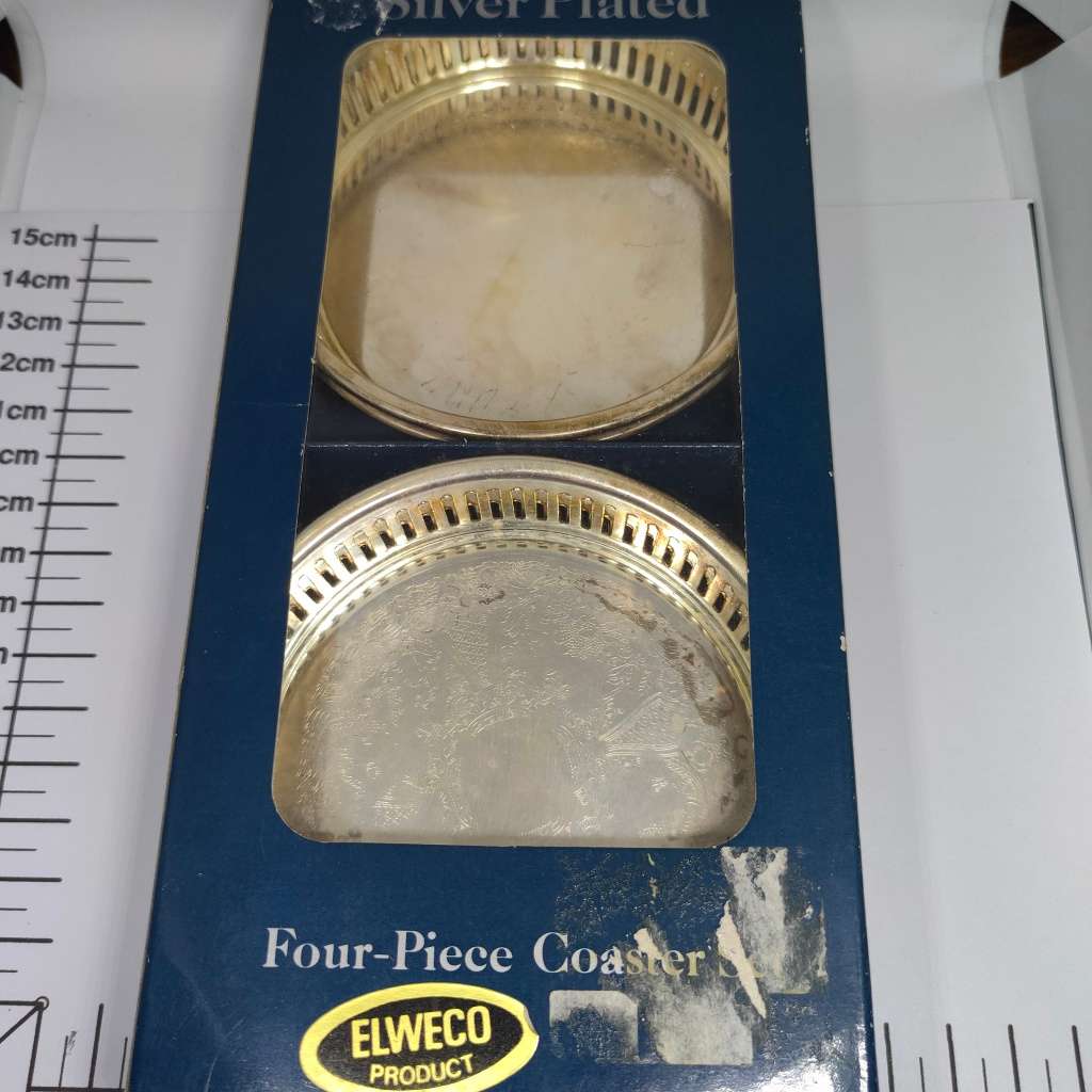 Vintage Elweco four-piece coaster set - silverplated