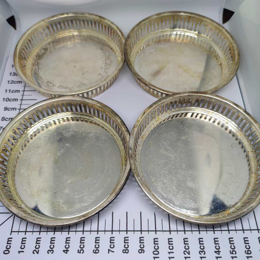 Vintage Elweco four-piece coaster set - silverplated