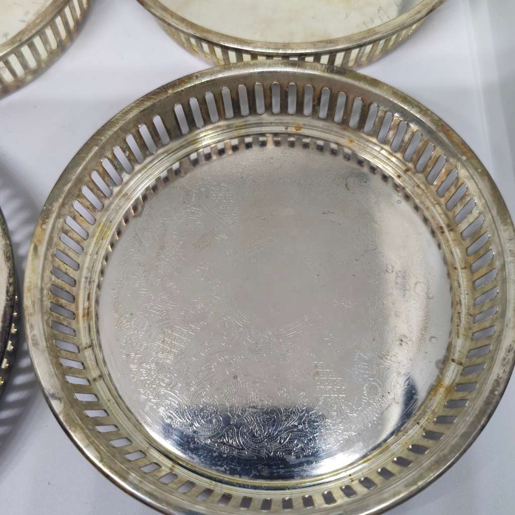 Vintage Elweco four-piece coaster set - silverplated