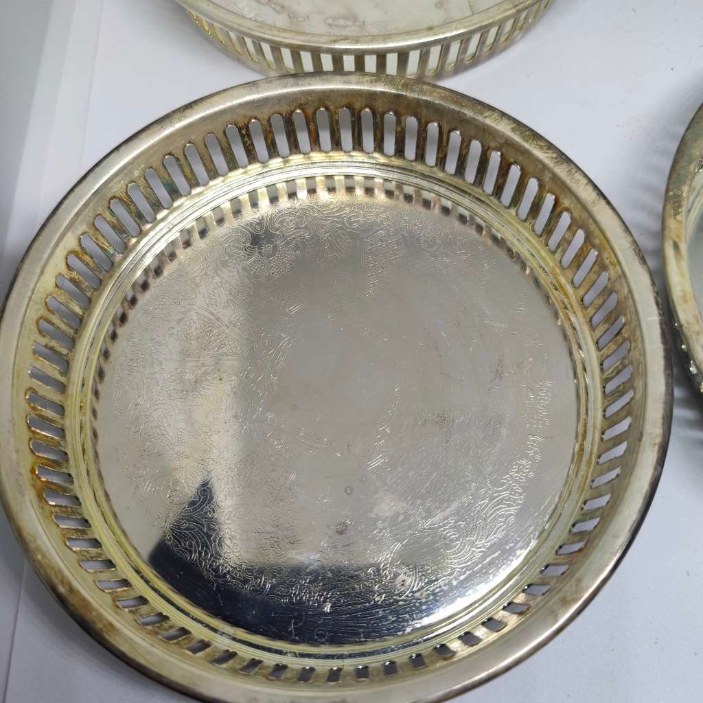 Vintage Elweco four-piece coaster set - silverplated