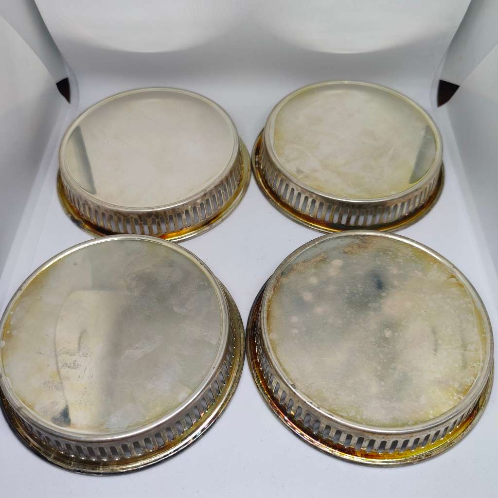 Vintage Elweco four-piece coaster set - silverplated