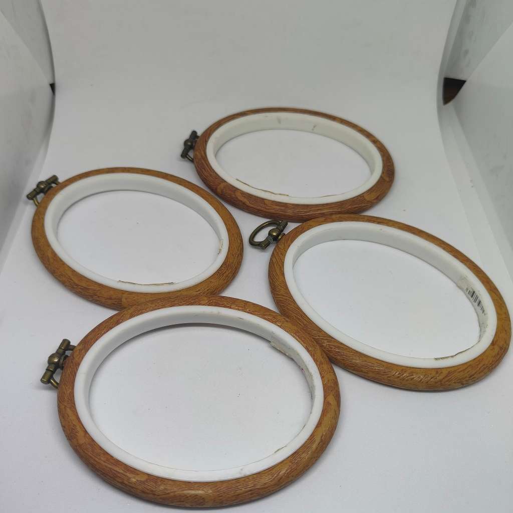 Four oval embroidery hoops