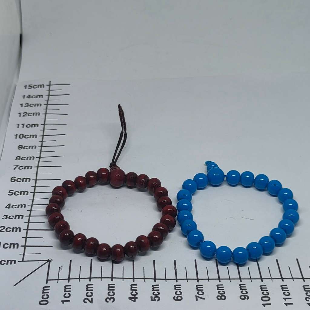 2 beaded bracelets on auction