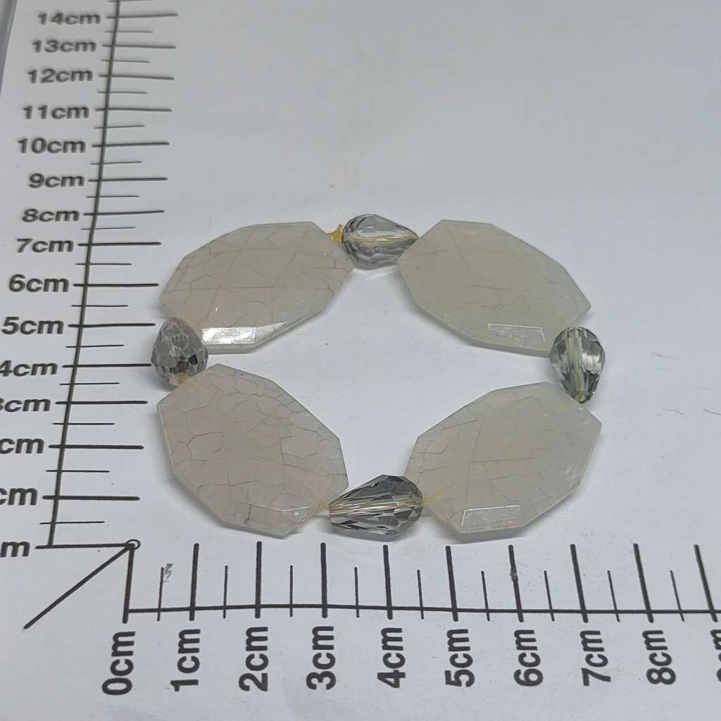 Interesting white beaded bracelet