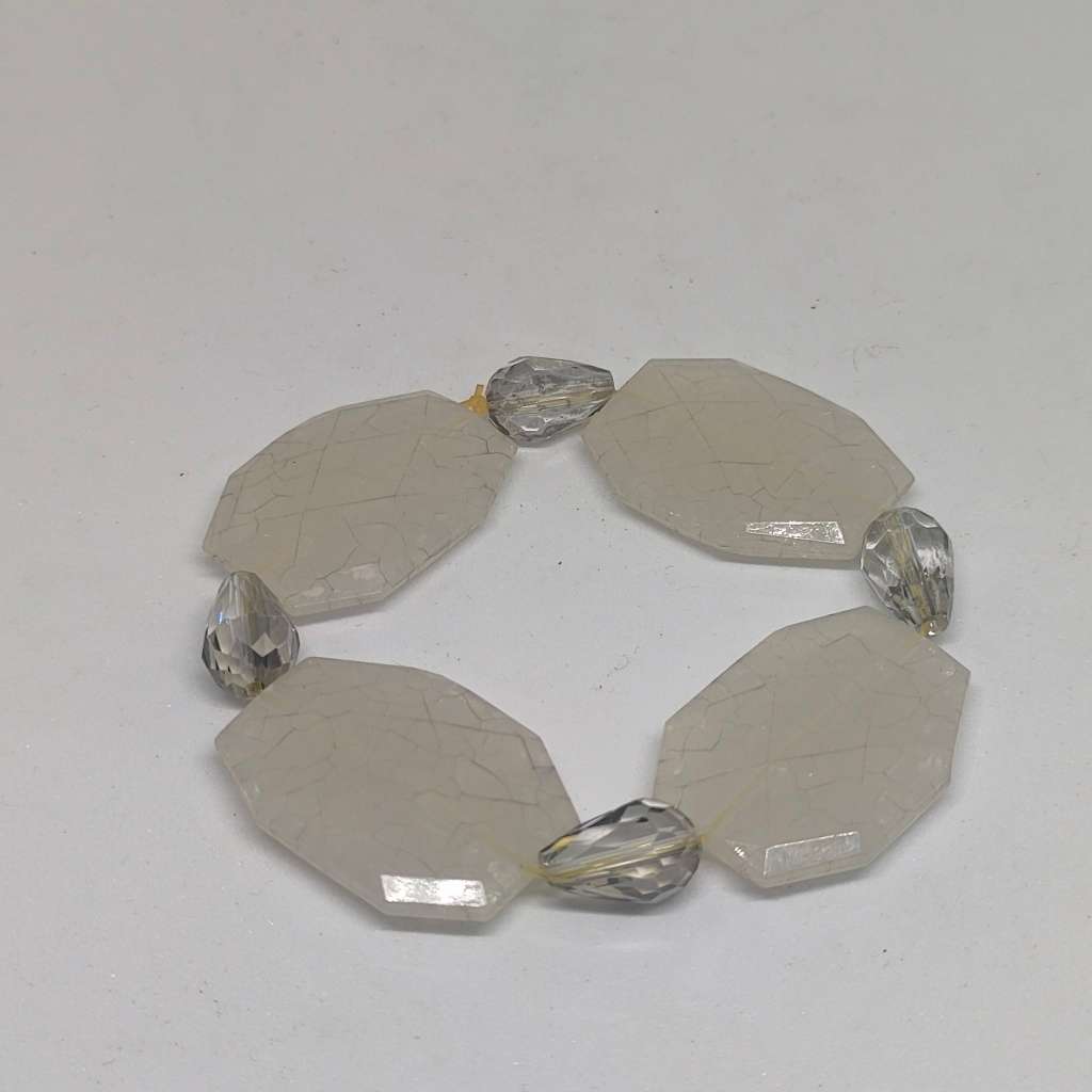 Interesting white beaded bracelet