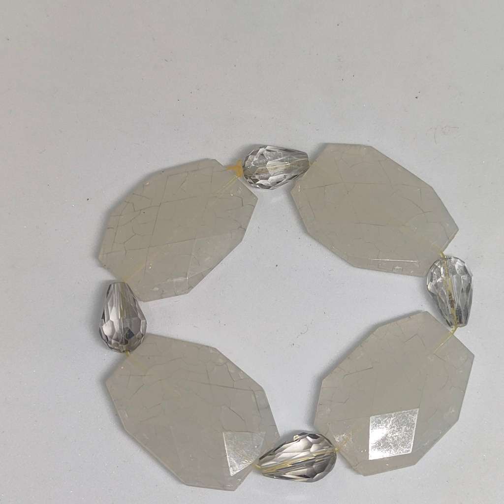 Interesting white beaded bracelet