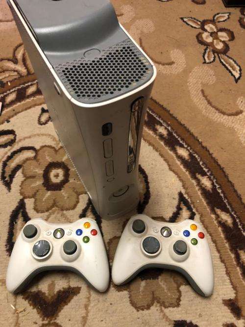 Xbox 360 (60GB) with 2 controllers, cables and 2 games