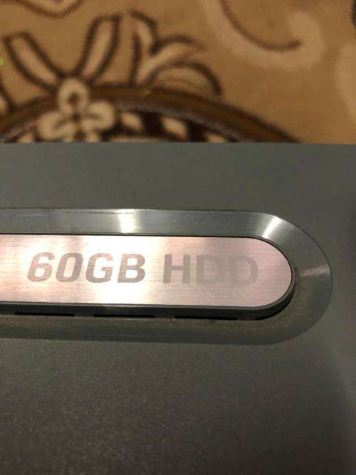 Xbox 360 (60GB) with 2 controllers, cables and 2 games