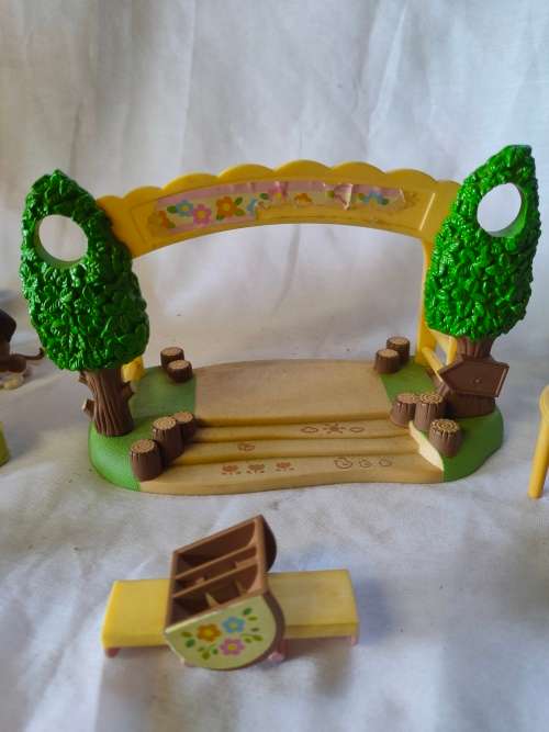 Big lot of original Sylvanian families furniture and outside playset