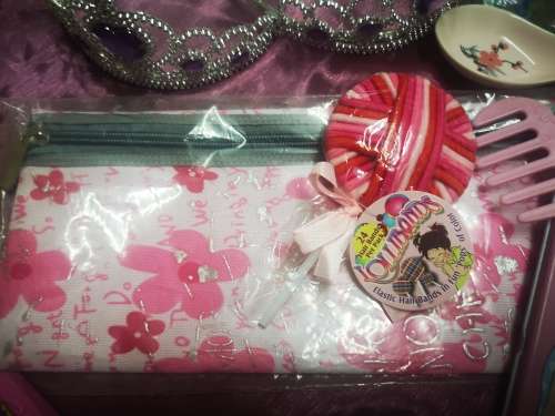 Big lot of girly goodies, includes tiaras, pink swords, pencil bag (never used) and more...