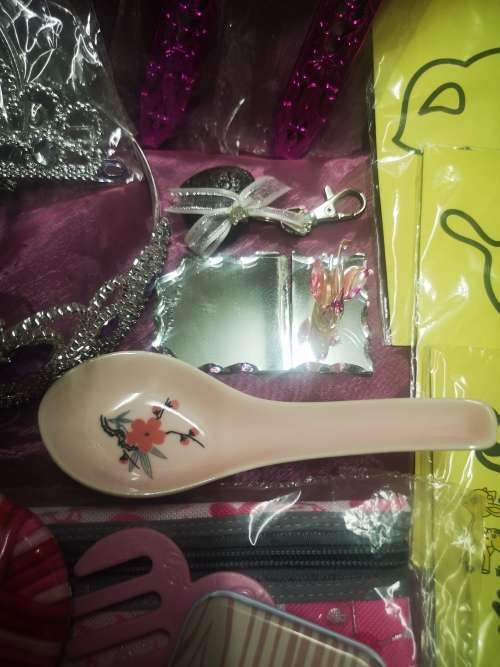 Big lot of girly goodies, includes tiaras, pink swords, pencil bag (never used) and more...