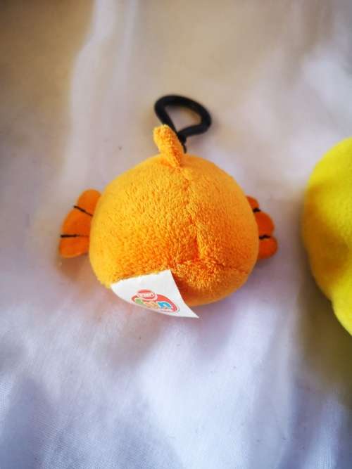 Three cute little plush toys - a pillow, a beanie toy and a key holder.