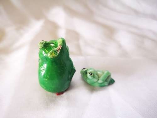 Lot of green ornaments - frogs and tortoises