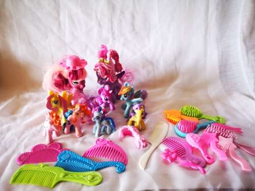 A lovely lot of genuine my little ponies and hair brushes/combs