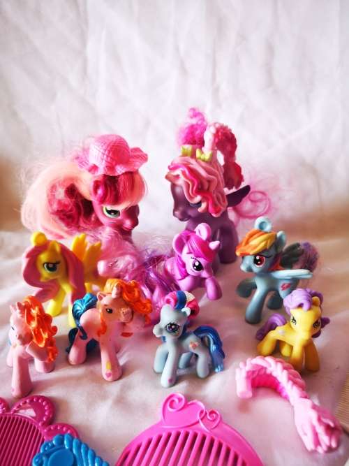 A lovely lot of genuine my little ponies and hair brushes/combs