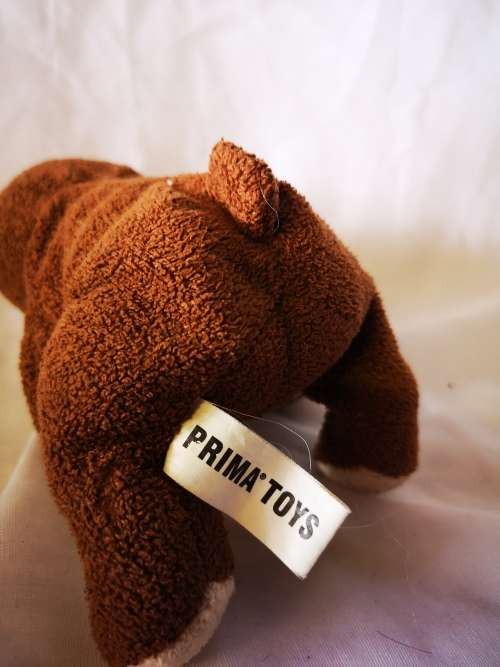 Adorable little Prima Toys brown bear on offer