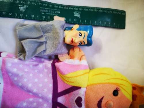 Three hand puppets on auction