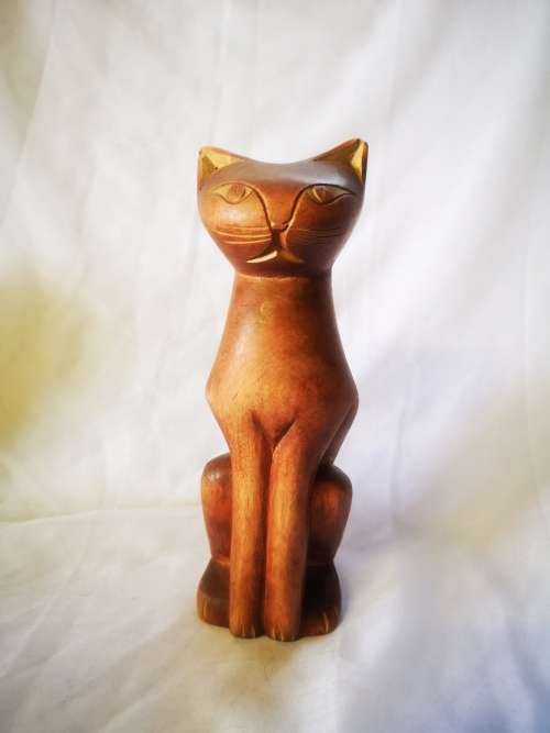 A stunning carved wood cat