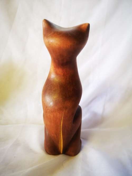 A stunning carved wood cat