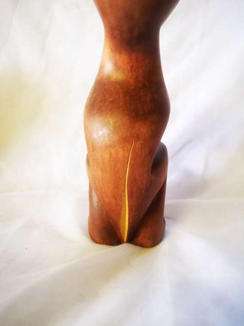 A stunning carved wood cat