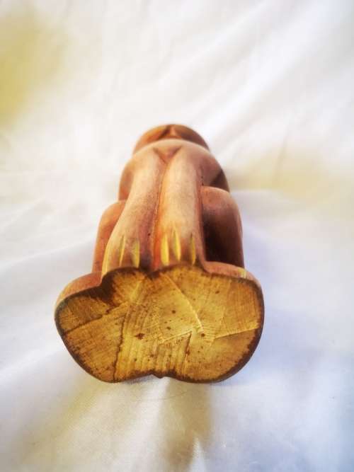 A stunning carved wood cat