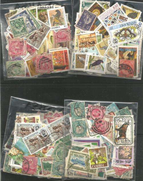 MIXED WORLD USED LOT IN PKTS. SOME DUPP.REF.144