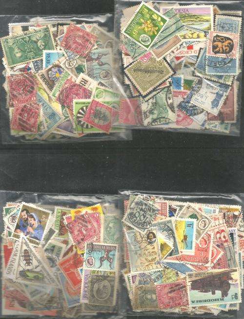 MIXED WORLD USED LOT IN PKTS. SOME DUPP.REF.60T