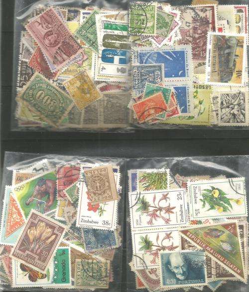 MIXED WORLD MINT & USED LOT IN PKTS. SOME DUPP.REF.59