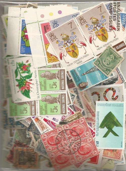 MIXED WORLD MINT & USED   LOT IN PKT,SOME DUPP.55 .GS