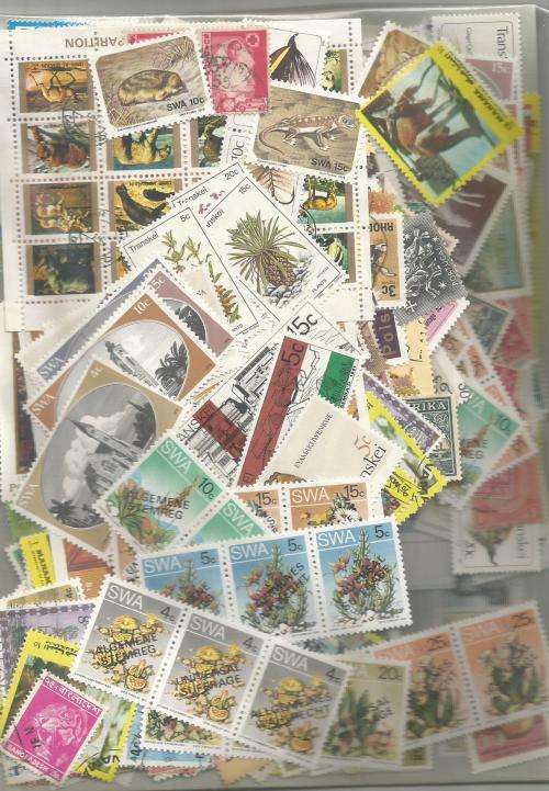 MIXED WORLD MINT & USED   LOT IN PKT,SOME DUPP.100 .GS