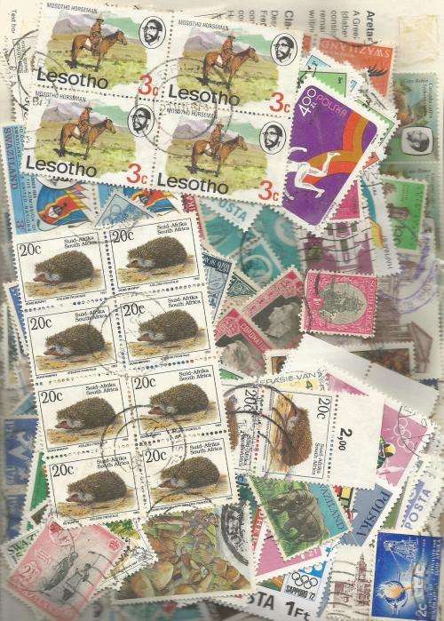 MIXED WORLD    USED   LOT IN PKT, .60 .GS