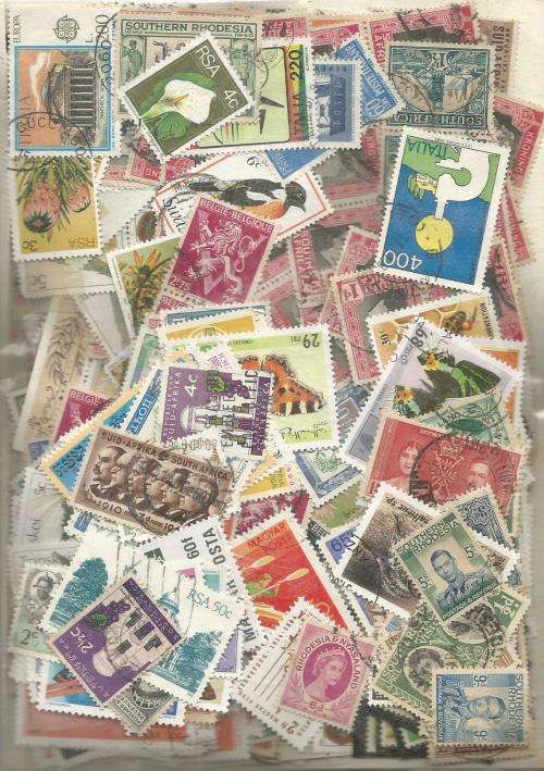 MIXED WORLD    USED   LOT IN PKT, .70 .GS