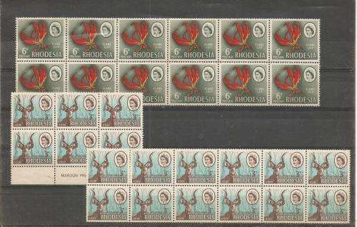 RHODESIA  UN MOUNTED MINT LOT  IN BLOCKS