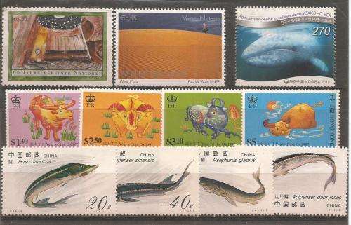 MIXED WORLD UN MOUNTED MINT SETS & PART SETS