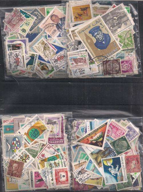 MIXED  WORLD   USED LOT IN PKTS.