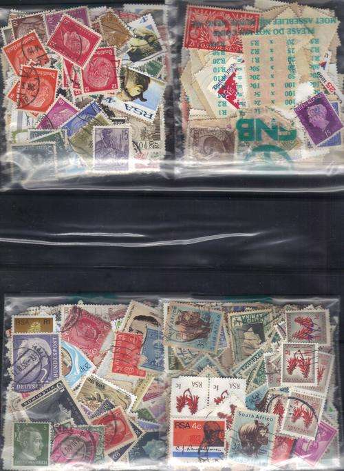 MIXED WORLD  302   USED LOT IN PKTS. SOME DUPP.