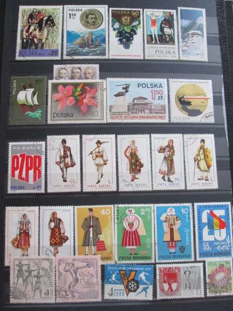 PAGE OF PREVIOUSLY HINGED STAMPS-RUMANIA/POLAND/RUSSIA