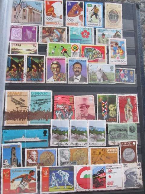 PAGE OF PREVIOUSLY HINGED STAMPS-GRENADA/GREECE/GHANA/DOMINICA/GUINEA