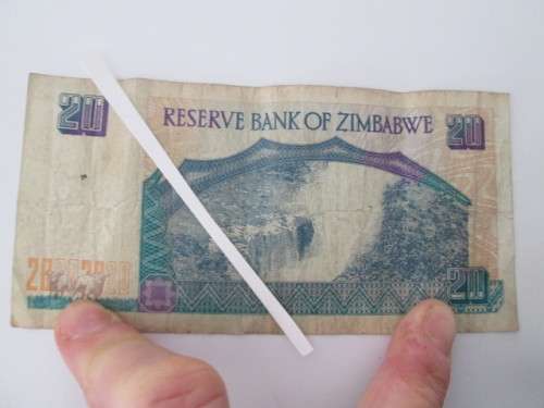 ZIMBABWE 20 DOLLARS CREASED 1997