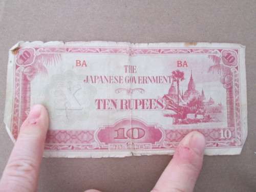 JAPAN - THE JAPANESE GOVERNMENT TEN RUPEES 1942 INVASION OF BURMA  CREASED AND EDGES ROUGH