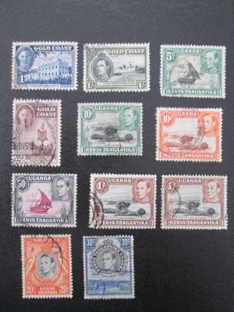 UGANDA AND GOLD COAST STAMPS USED UNHINGED
