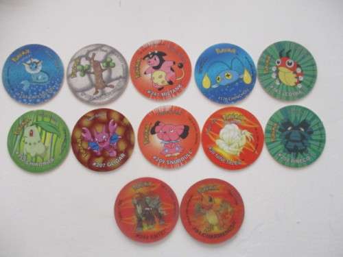 10 POKEMON TAZOS  AND 2 3D POKEMON TAZOS - 12 PIECES