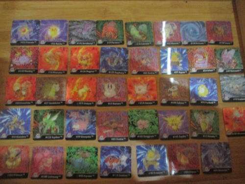 39 Holographic Pokemon tazos and 9 holographic stickers
